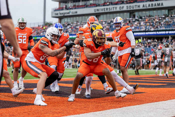 Brevyn Spann-Ford celebrates his touchdown catch